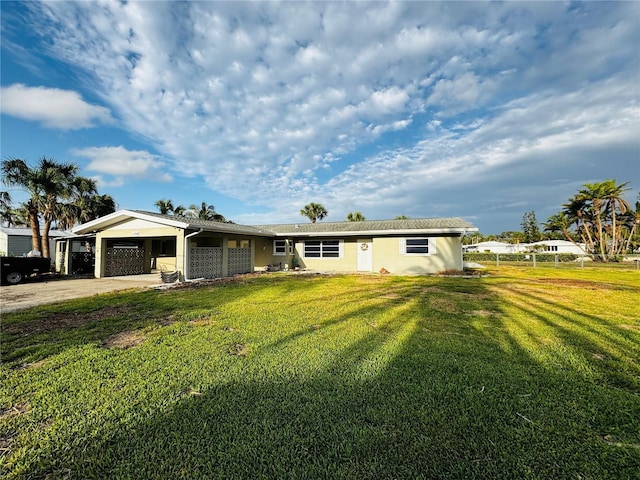 104 Pops Ln, Nokomis, FL 34275 - ranch-style home with driveway and a carport