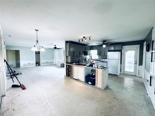 104 Pops Ln, Nokomis, FL 34275 - kitchen with freestanding refrigerator, a ceiling fan, open floor plan, and pendant lighting
