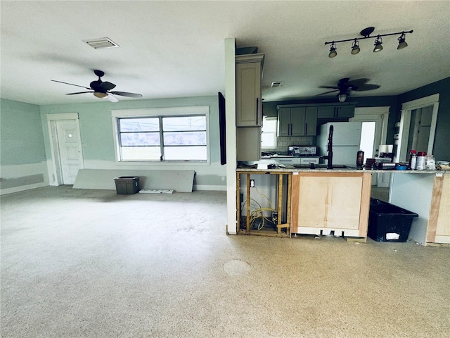 104 Pops Ln, Nokomis, FL 34275 - kitchen featuring ceiling fan, freestanding refrigerator, and open floor plan