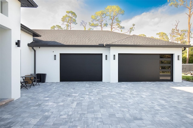 6713 Taneytown St, North Port, FL 34291 - garage featuring decorative driveway