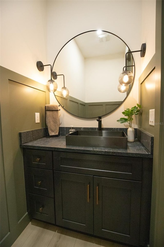 6713 Taneytown St, North Port, FL 34291 - bathroom with vanity and wood finished floors