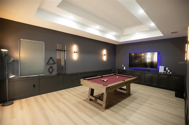 6713 Taneytown St, North Port, FL 34291 - rec room featuring a raised ceiling, light wood finished floors, billiards table, a decorative wall, and wainscoting