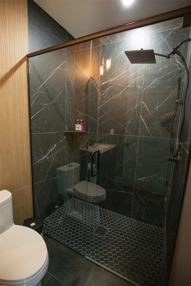 6713 Taneytown St, North Port, FL 34291 - bathroom with toilet, a marble finish shower, and tile patterned flooring