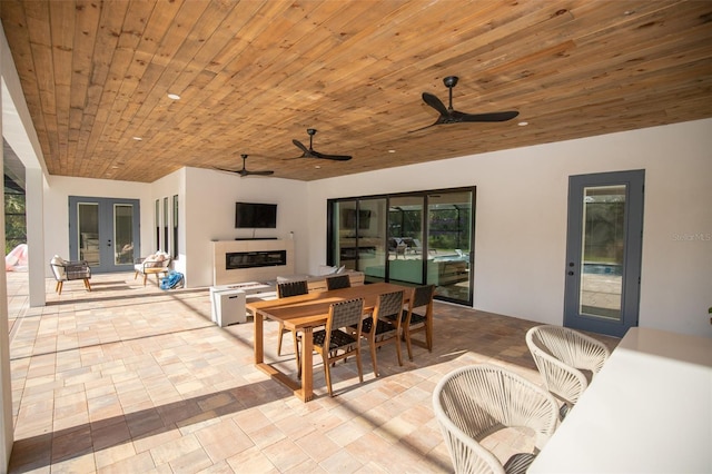 6713 Taneytown St, North Port, FL 34291 - view of patio / terrace featuring french doors, outdoor dining space, and a ceiling fan
