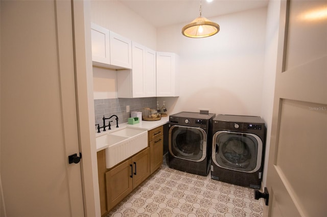 6713 Taneytown St, North Port, FL 34291 - laundry room with washer and clothes dryer and cabinet space