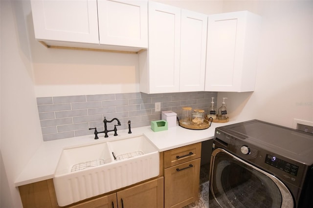 6713 Taneytown St, North Port, FL 34291 - laundry area with washer / dryer and cabinet space