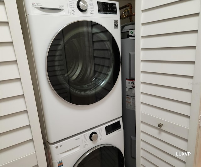 2124 N Tamiami Trl Unit 108, Sarasota, FL 34234 - washroom with stacked washing machine and dryer