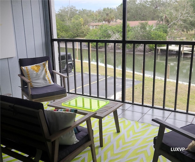 2124 N Tamiami Trl Unit 108, Sarasota, FL 34234 - balcony featuring a water view