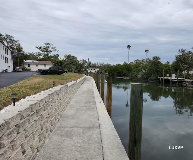 2124 N Tamiami Trl Unit 108, Sarasota, FL 34234 - dock area featuring a water view