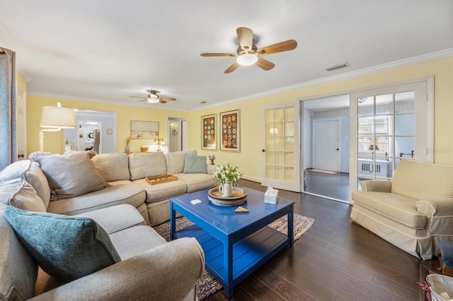 102 28th St W, Bradenton, FL 34205 - living room featuring a ceiling fan, crown molding, dark wood finished floors, and baseboards