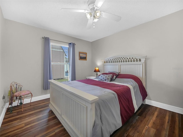 27 Sea Shark Path, Palm Coast, FL 32164 - bedroom featuring baseboards, wood finished floors, a textured ceiling, and a ceiling fan