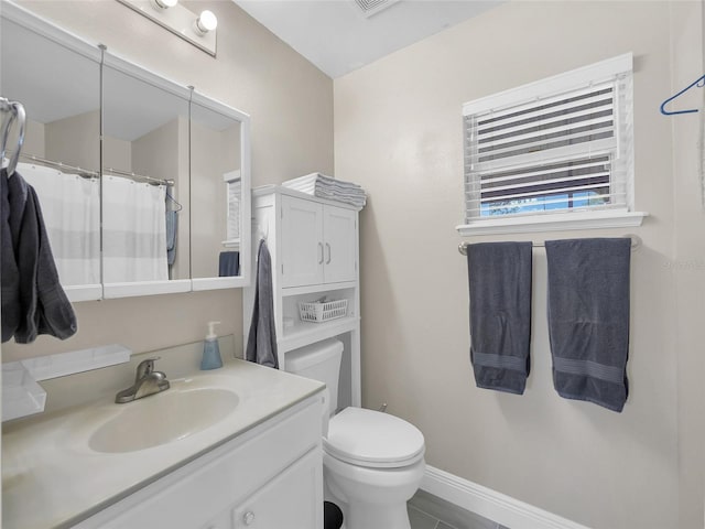 27 Sea Shark Path, Palm Coast, FL 32164 - full bath with vanity, toilet, and baseboards