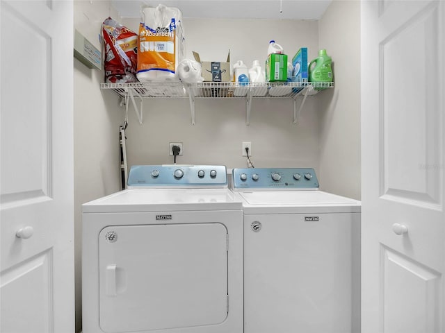 27 Sea Shark Path, Palm Coast, FL 32164 - laundry area with washer and clothes dryer