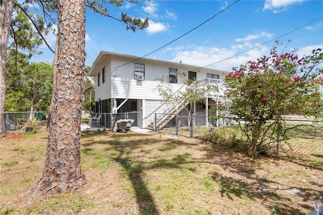 5403 Fleming St, Port Charlotte, FL 33981 - back of property with stairway and a gate