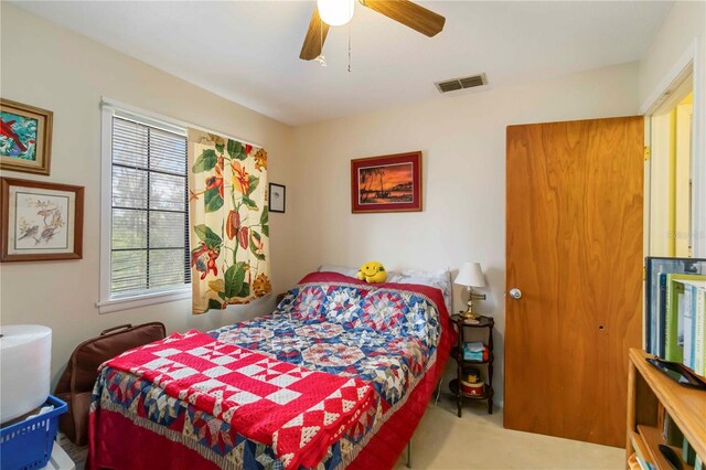 5403 Fleming St, Port Charlotte, FL 33981 - carpeted bedroom with a ceiling fan