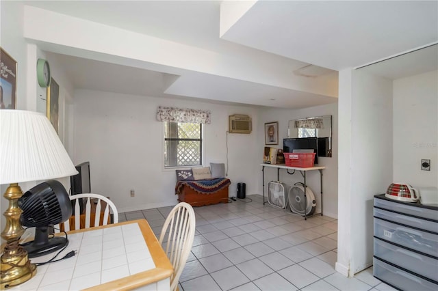 5403 Fleming St, Port Charlotte, FL 33981 - dining room featuring light tile patterned floors, a wall unit AC, and baseboards