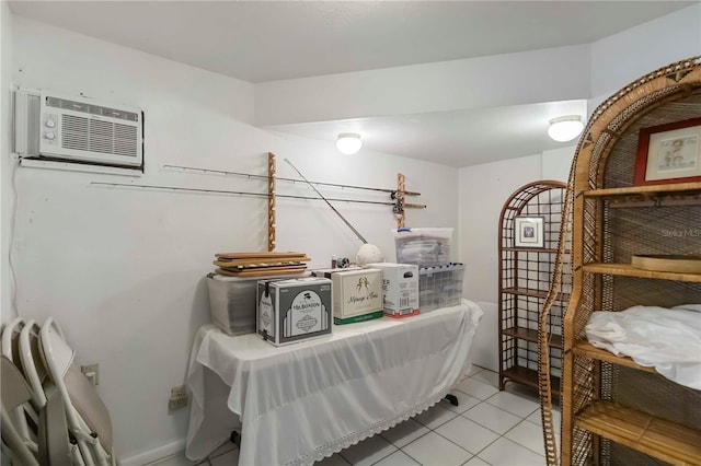 5403 Fleming St, Port Charlotte, FL 33981 - laundry room featuring a wall mounted AC and light tile patterned flooring