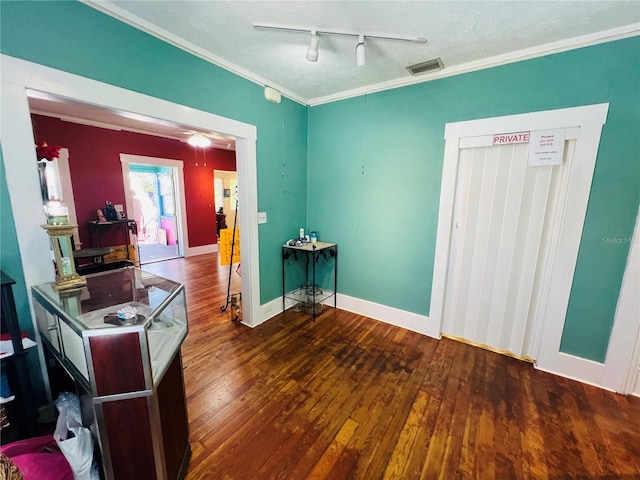 1019 10th Ave W, Bradenton, FL 34205 - office with crown molding, wood-type flooring, baseboards, and rail lighting