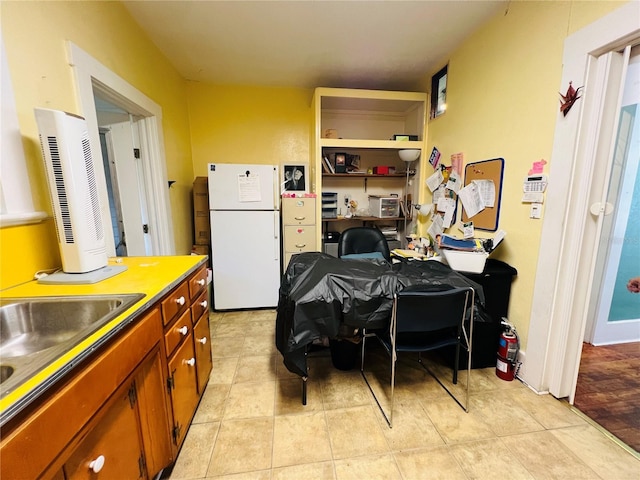 1019 10th Ave W, Bradenton, FL 34205 - home office featuring light tile patterned floors and a sink