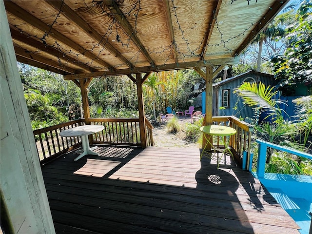 1019 10th Ave W, Bradenton, FL 34205 - wooden terrace with an outdoor structure
