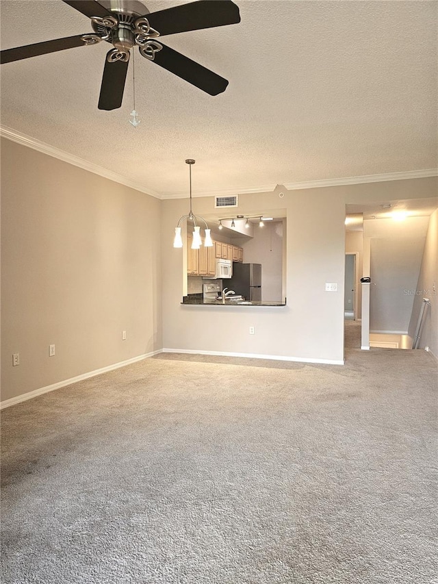 5711 Bentgrass Dr Unit 19-203, Sarasota, FL 34235 - unfurnished living room featuring a textured ceiling, ornamental molding, a ceiling fan, baseboards, and carpet flooring