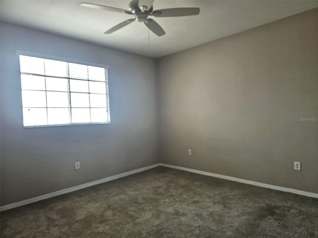 5711 Bentgrass Dr Unit 19-203, Sarasota, FL 34235 - empty room featuring carpet, a ceiling fan, and baseboards