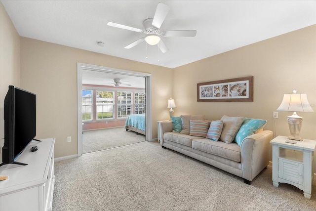 1723 Laramie St, Sarasota, FL 34231 - carpeted living room featuring ceiling fan and baseboards