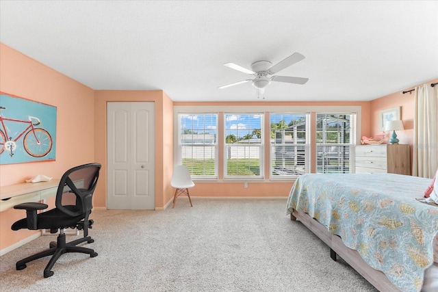 1723 Laramie St, Sarasota, FL 34231 - carpeted bedroom featuring baseboards, a desk, and a ceiling fan