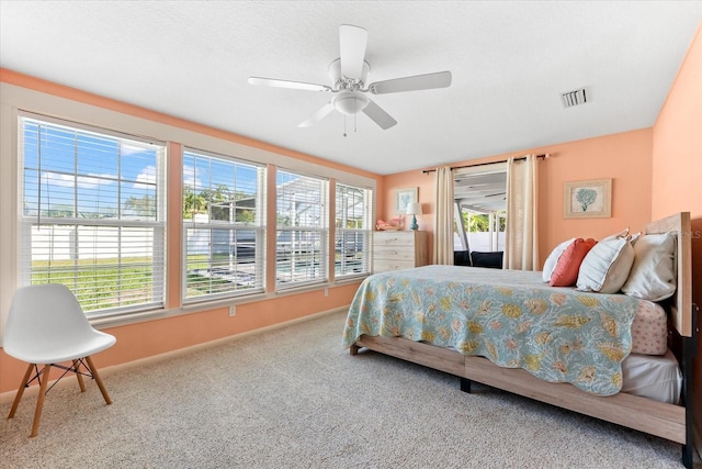 1723 Laramie St, Sarasota, FL 34231 - bedroom featuring multiple windows, carpet, baseboards, and ceiling fan