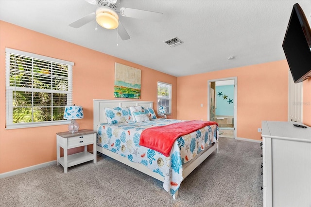 1723 Laramie St, Sarasota, FL 34231 - bedroom featuring carpet floors, baseboards, ceiling fan, and ensuite bathroom