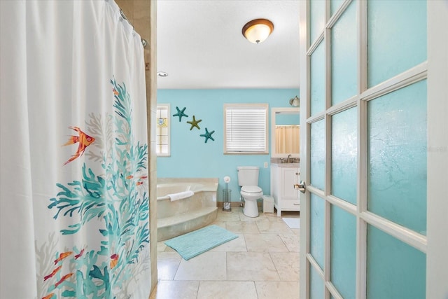 1723 Laramie St, Sarasota, FL 34231 - full bath featuring a garden tub, a sink, a shower with shower curtain, and toilet
