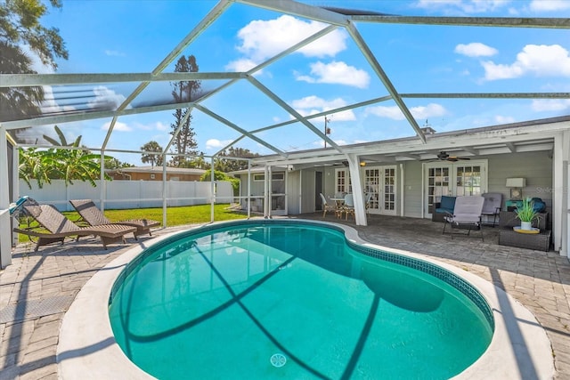1723 Laramie St, Sarasota, FL 34231 - view of pool with french doors, a patio area, a fenced backyard, ceiling fan, and glass enclosure