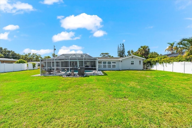 1723 Laramie St, Sarasota, FL 34231 - rear view of house with a lanai