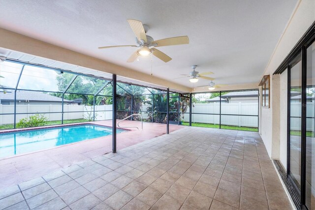 408 Fletcher St, Port Charlotte, FL 33954 - view of swimming pool featuring a patio, a fenced backyard, a ceiling fan, and a lanai