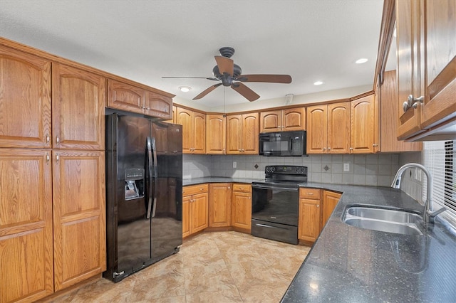 408 Fletcher St, Port Charlotte, FL 33954 - kitchen with black appliances, a sink, brown cabinets, ceiling fan, and decorative backsplash