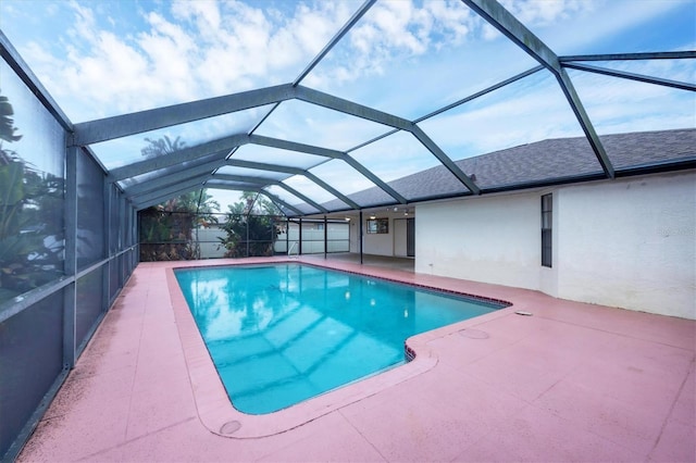 408 Fletcher St, Port Charlotte, FL 33954 - outdoor pool featuring a patio and glass enclosure