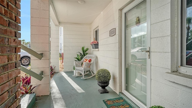 1838 Restful Dr Unit K-1, Bradenton, FL 34207 - view of exterior entry featuring a porch