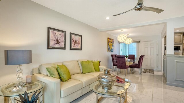 1838 Restful Dr Unit K-1, Bradenton, FL 34207 - living area featuring a ceiling fan, recessed lighting, and light marble finish flooring
