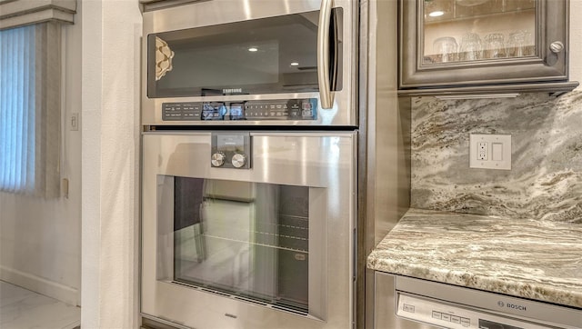 1838 Restful Dr Unit K-1, Bradenton, FL 34207 - kitchen view of double oven and glass insert cabinets
