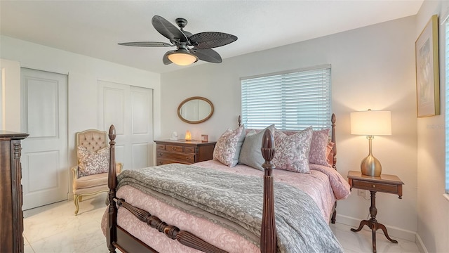 1838 Restful Dr Unit K-1, Bradenton, FL 34207 - bedroom with a ceiling fan, baseboards, and a closet