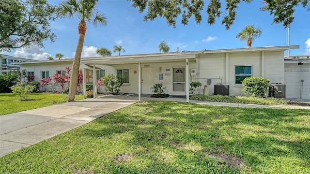 1838 Restful Dr Unit K-1, Bradenton, FL 34207 - single story home with a front yard and central AC unit