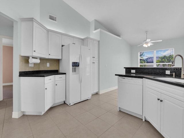 3616 SE 8th Pl, Cape Coral, FL 33904 - kitchen featuring white appliances, vaulted ceiling, a sink, tasteful backsplash, and ceiling fan