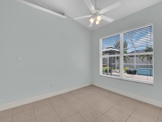 3616 SE 8th Pl, Cape Coral, FL 33904 - unfurnished room featuring vaulted ceiling, baseboards, ceiling fan, and light tile patterned floors