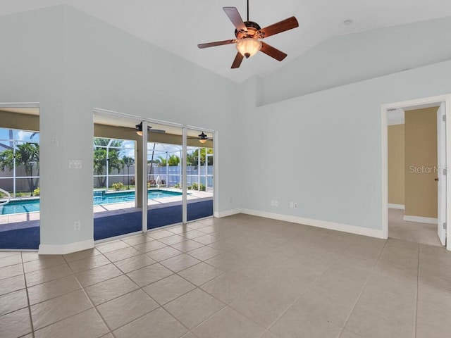 3616 SE 8th Pl, Cape Coral, FL 33904 - tiled empty room with a ceiling fan, lofted ceiling, baseboards, and a sunroom