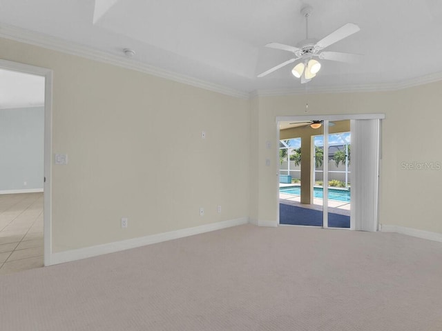 3616 SE 8th Pl, Cape Coral, FL 33904 - spare room featuring crown molding, carpet floors, a ceiling fan, and baseboards