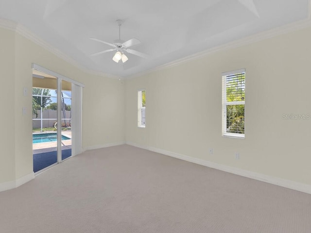 3616 SE 8th Pl, Cape Coral, FL 33904 - carpeted spare room featuring crown molding, plenty of natural light, baseboards, and ceiling fan