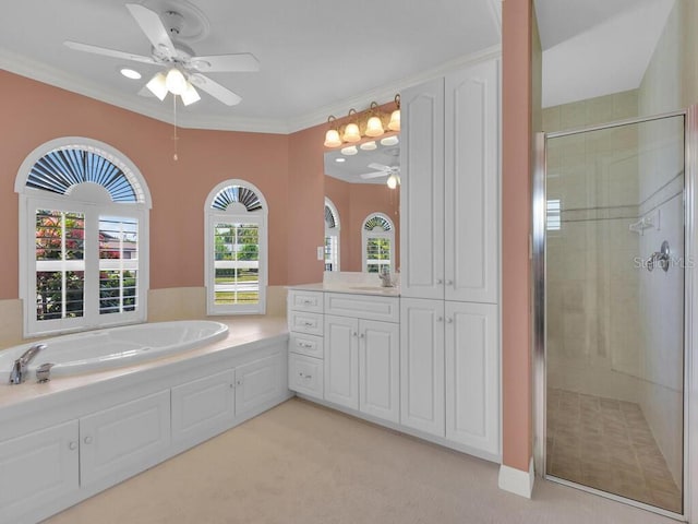3616 SE 8th Pl, Cape Coral, FL 33904 - bathroom with a ceiling fan, a stall shower, vanity, a garden tub, and ornamental molding