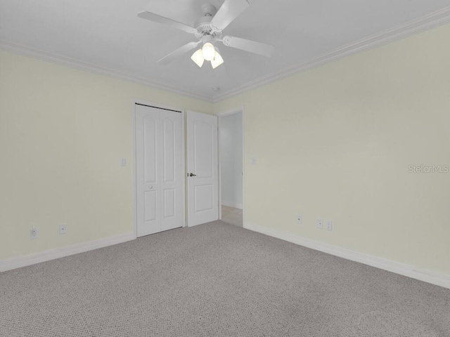 3616 SE 8th Pl, Cape Coral, FL 33904 - unfurnished bedroom with carpet floors, ornamental molding, a closet, baseboards, and a ceiling fan