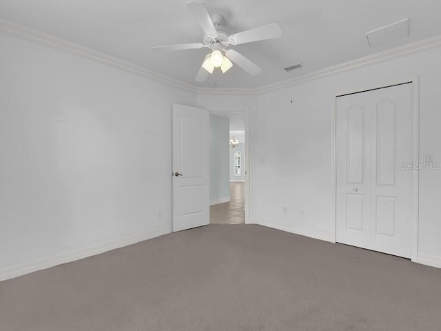 3616 SE 8th Pl, Cape Coral, FL 33904 - unfurnished bedroom featuring carpet floors, ornamental molding, ceiling fan, a closet, and baseboards