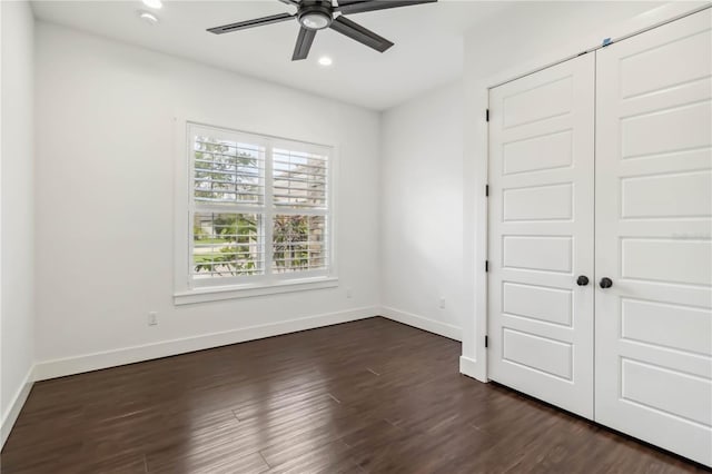 1015 143rd St NE, Bradenton, FL 34212 - unfurnished bedroom featuring baseboards, recessed lighting, dark wood-style floors, a closet, and ceiling fan